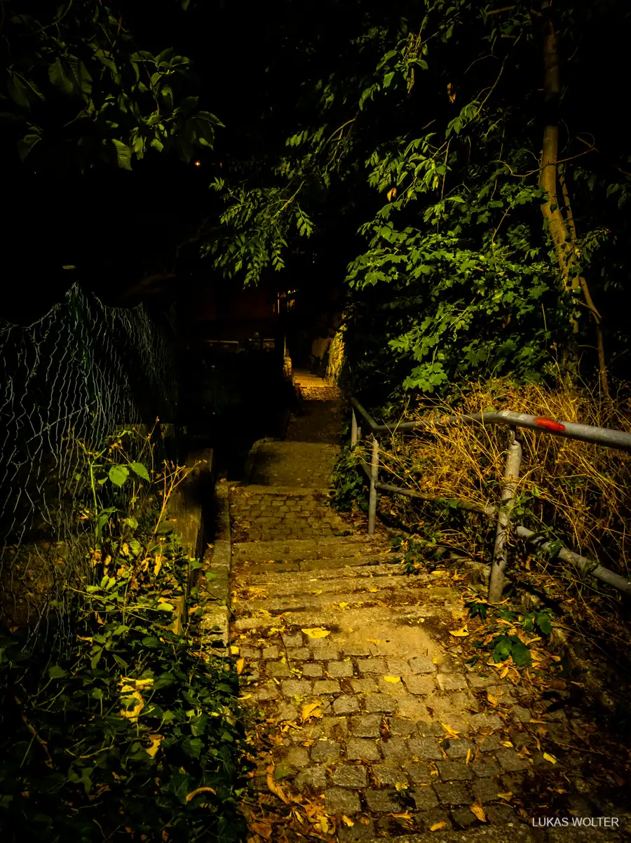 Lit staircase at night
